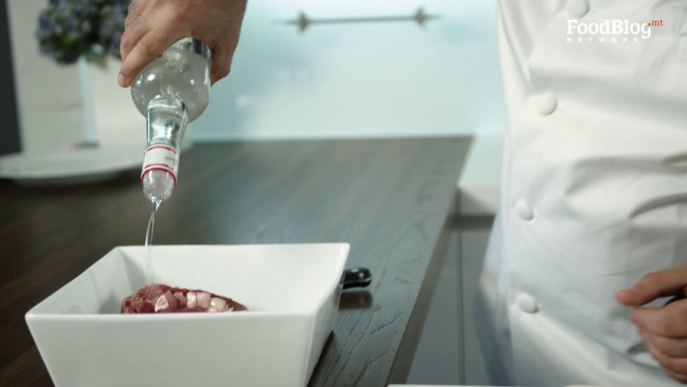 Marvin Gauci marinating the steak with Sambuca from FoodBlog Marvin's Five