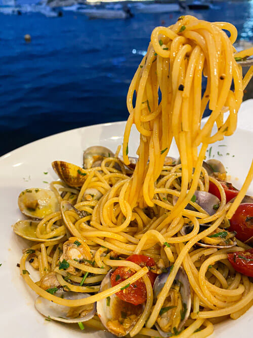 Spaghetti vongole overlooking the Marsalforn waterfront