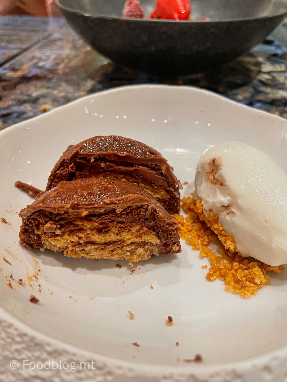 Double chocolate mousse, cocoa nib and almond brƻlƩe, marzipan and tangerine ice-cream