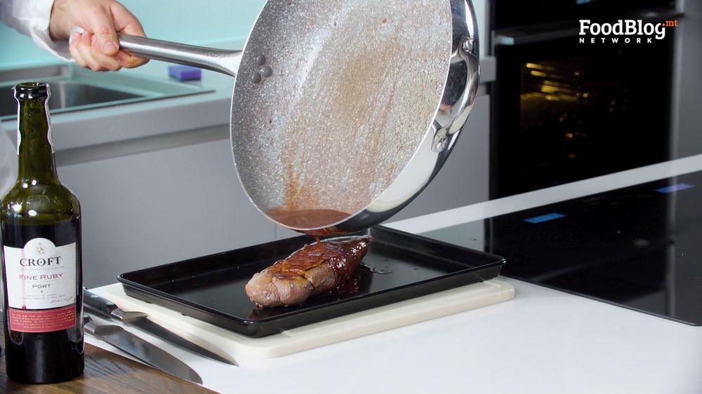 Pork fillet resting on a baking tray with excess reduced port poured on top on FoodBlog's Marvin's Five