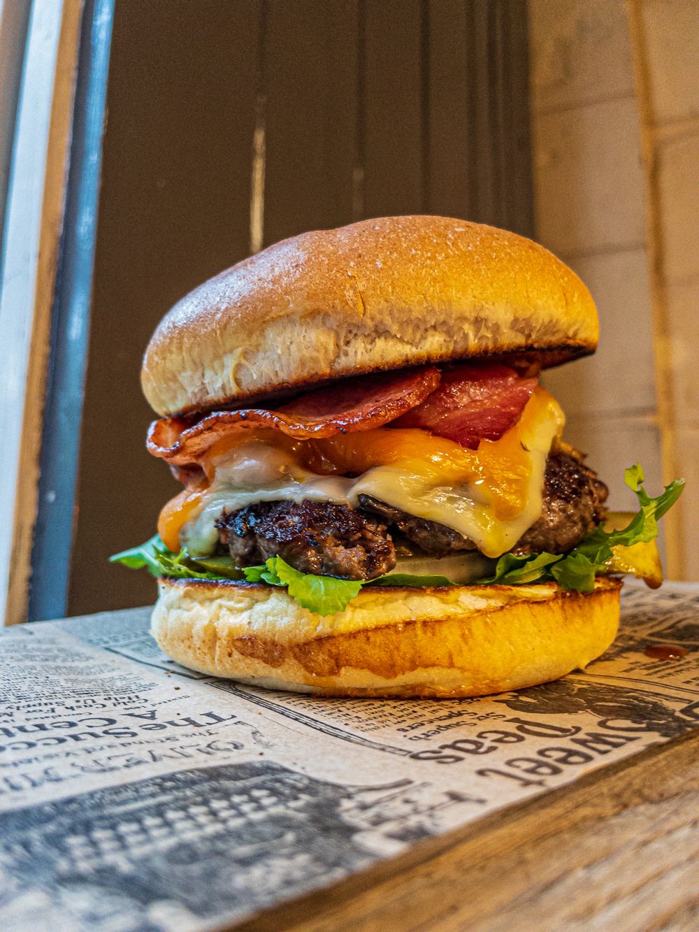 Stanjata Burger made with 100% beef, mushrooms, bacon, cheese, gherkins, rocket and a burger sauce.