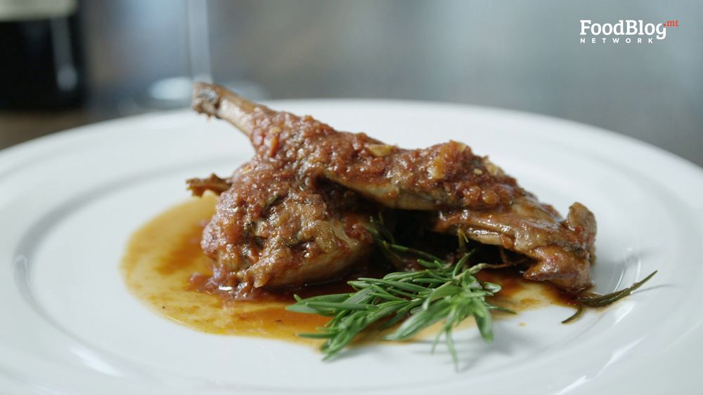 Final plating of Marvin's 5 rabbit and amber ale, blue label sauce