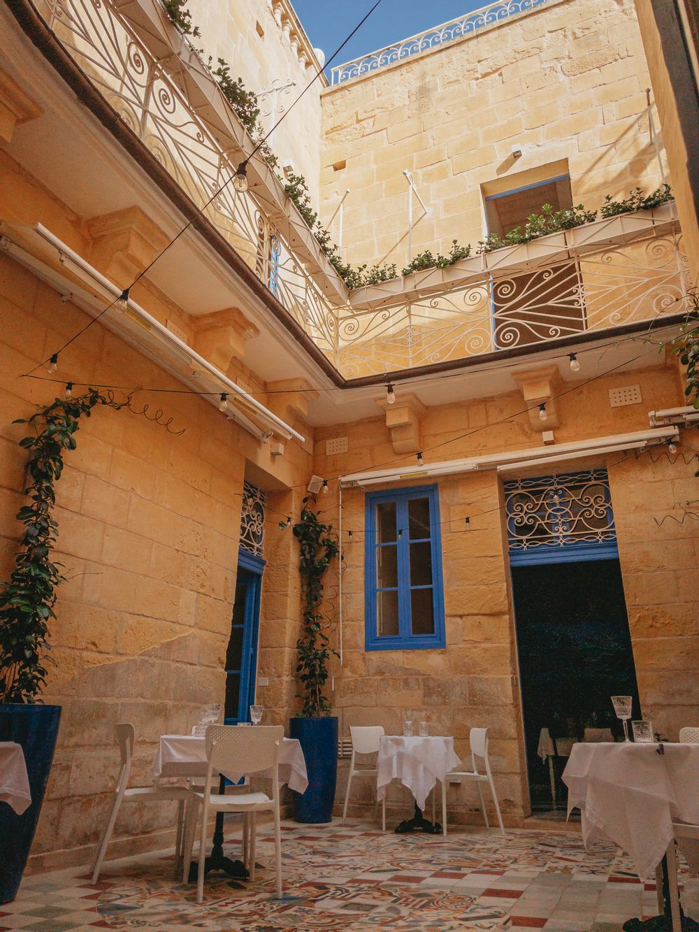 The courtyard inside the Blue House restaurant in Birgu
