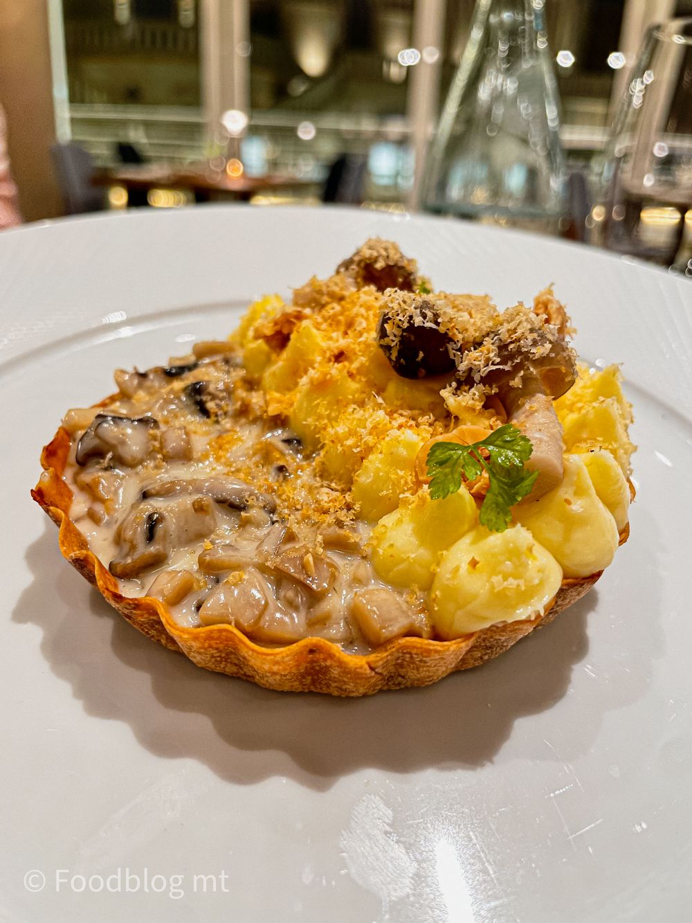 Warm wild mushroom tart, goatās cheese custard, raw and pickled mushroom and hazelnuts at Seed