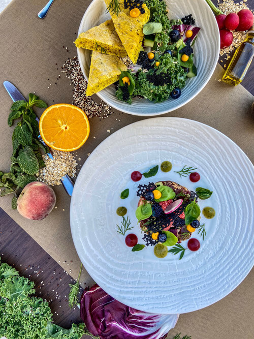 The side salad placed next to the tuna tartar. This makes a great addition to already flavorful and beautiful dish