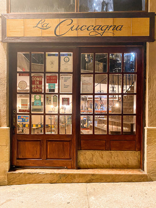 The authentic Italian trattoria entrance of Cuccagna in Amery Street, Sliema