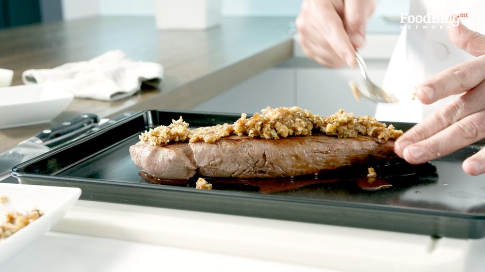Marvin Gauci packing the fig and walnut jam to the pork fillet before adding it to preheated oven on FoodBlog's Marvin's Five