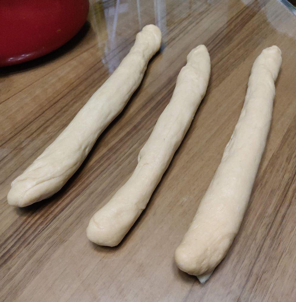 long strands to form challah braids