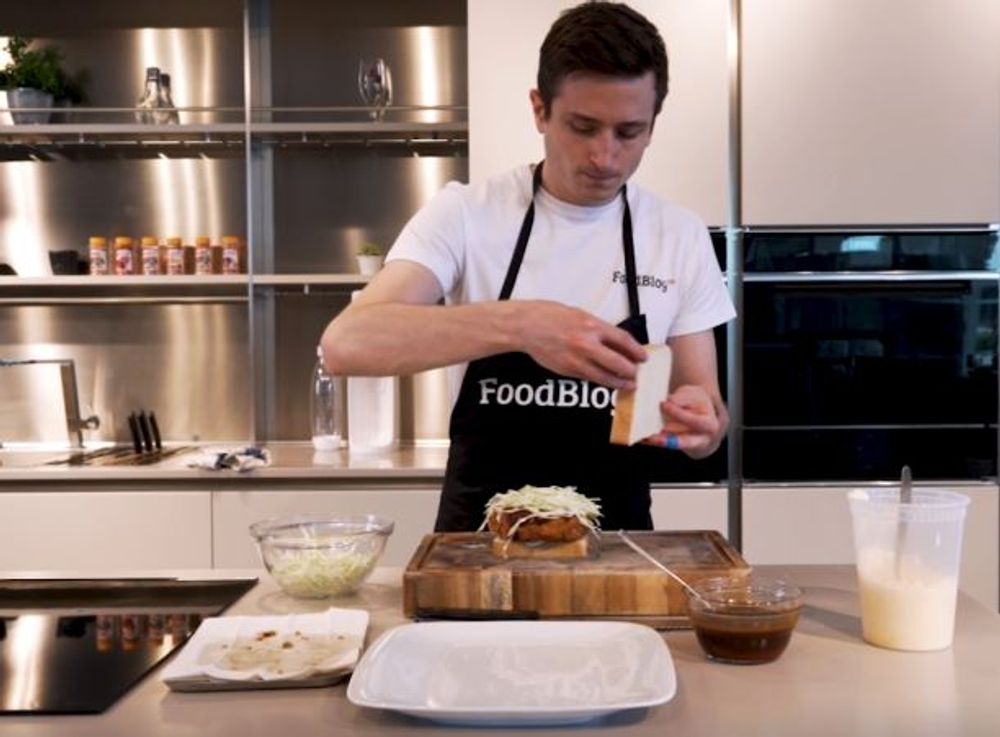 chef stephen trying out his chicken katsu and kinnie spritz combo at the fino kitchen