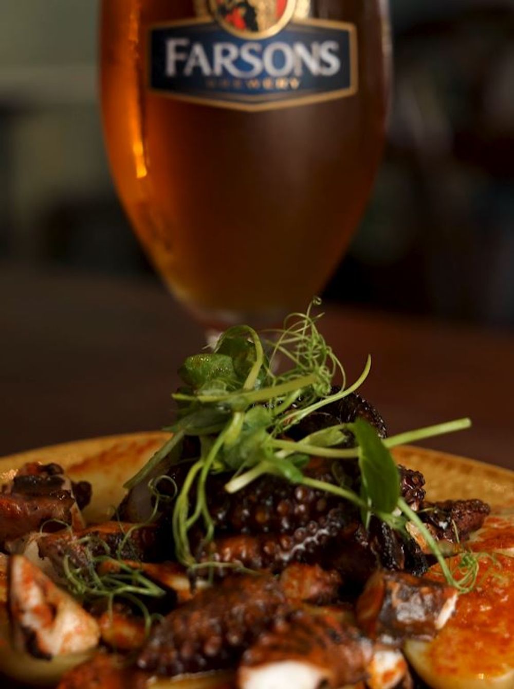 This Month's pairing is a delicious octopus dish with the Green Hop IPA from AYU!