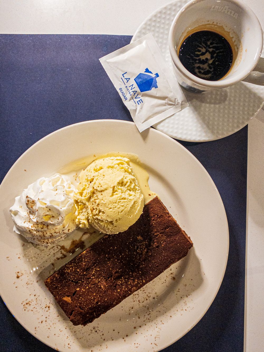 chocolate brownie with ice cream and coffee from la nave restaurant qawra malta