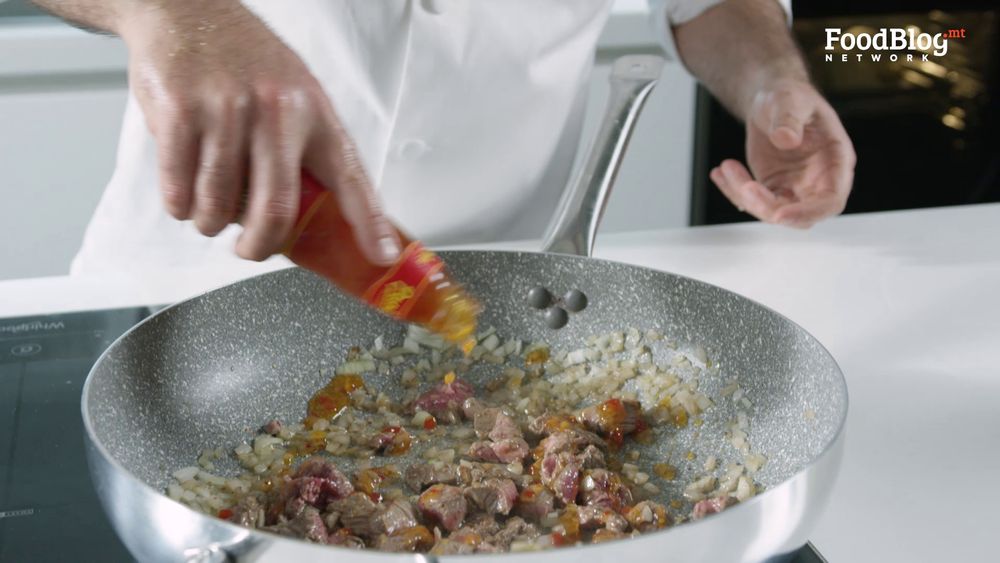 Marvin Gauci adding sweet chilli sauce into the beef and onion mixture on FoodBlog's Marvin's Five