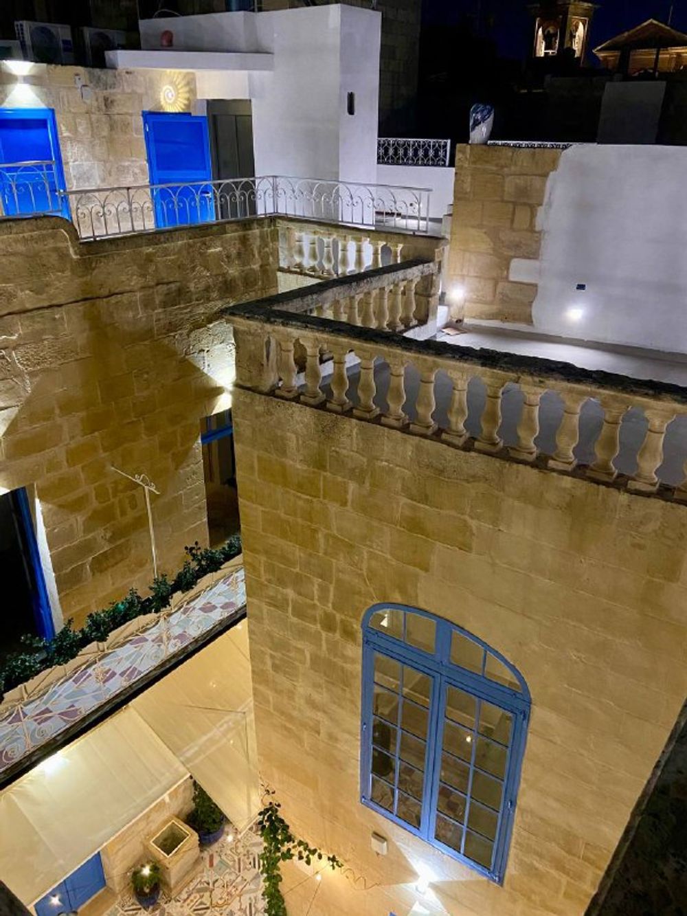 Overlooking the courtyard from the rooftop at Blue House, Birgu.