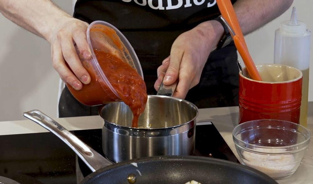 tomato sauce for pizza base prepared by Chef Stephen La Rosa