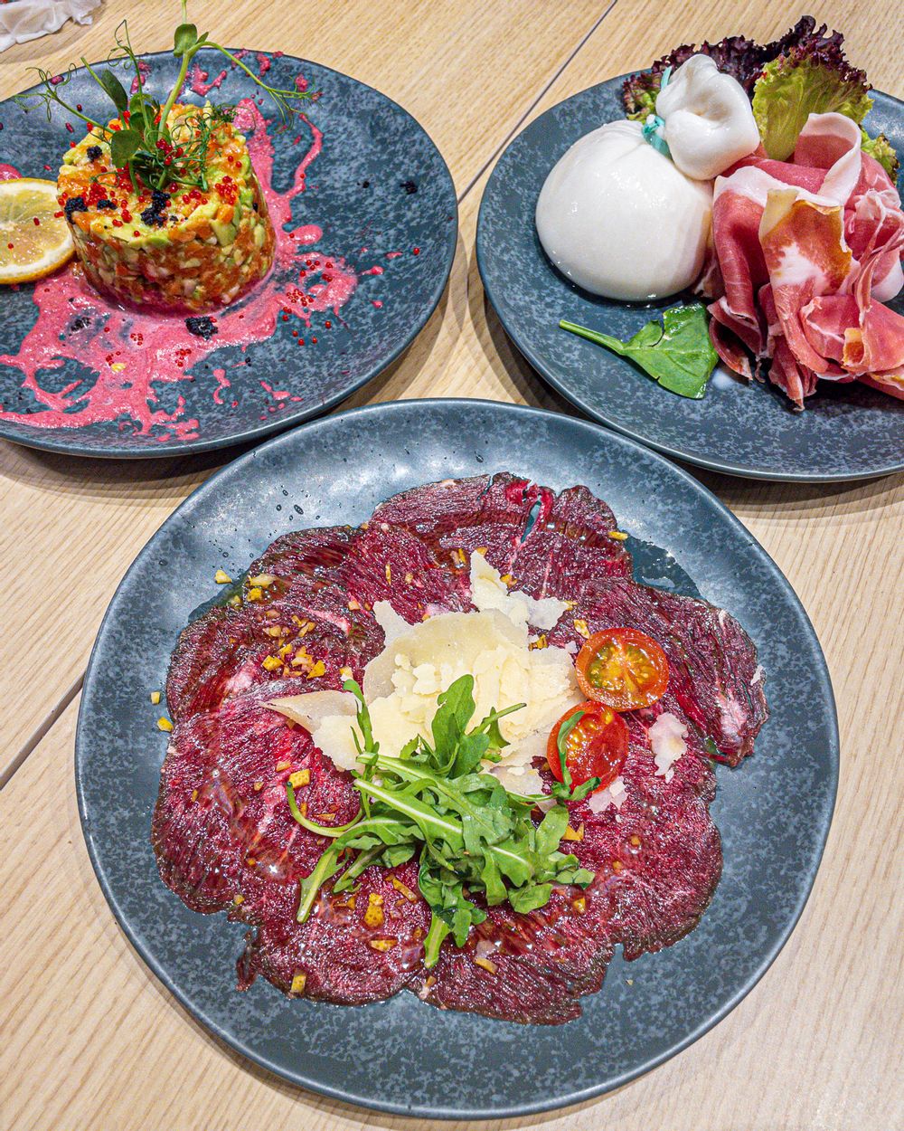 Tartare di Salmone, Carpaccio di Carne, Burrata e Prosciutto Crudo at Grana Valletta.