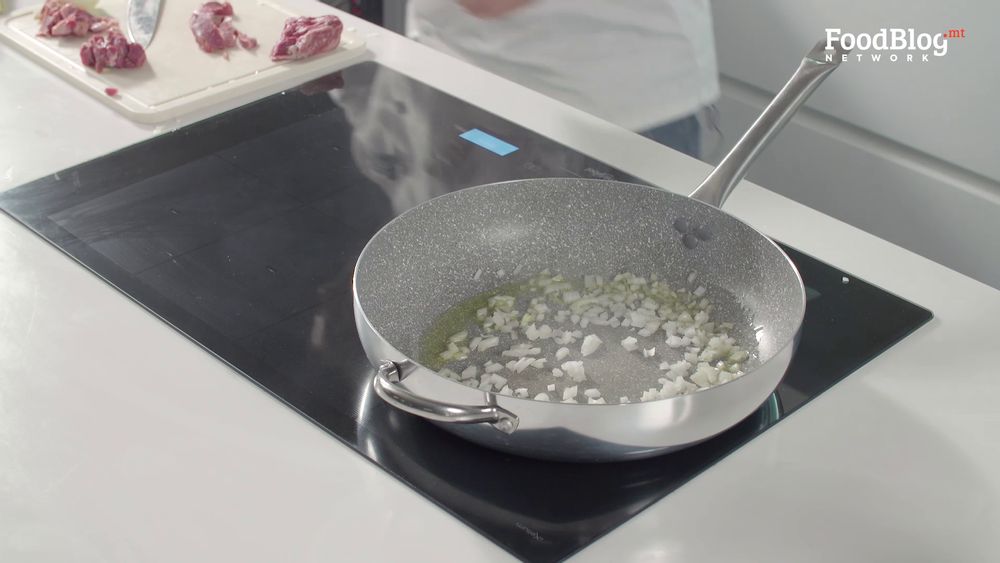 Onions caramelising in a hot pan on FoodBlog's Marvin's Five