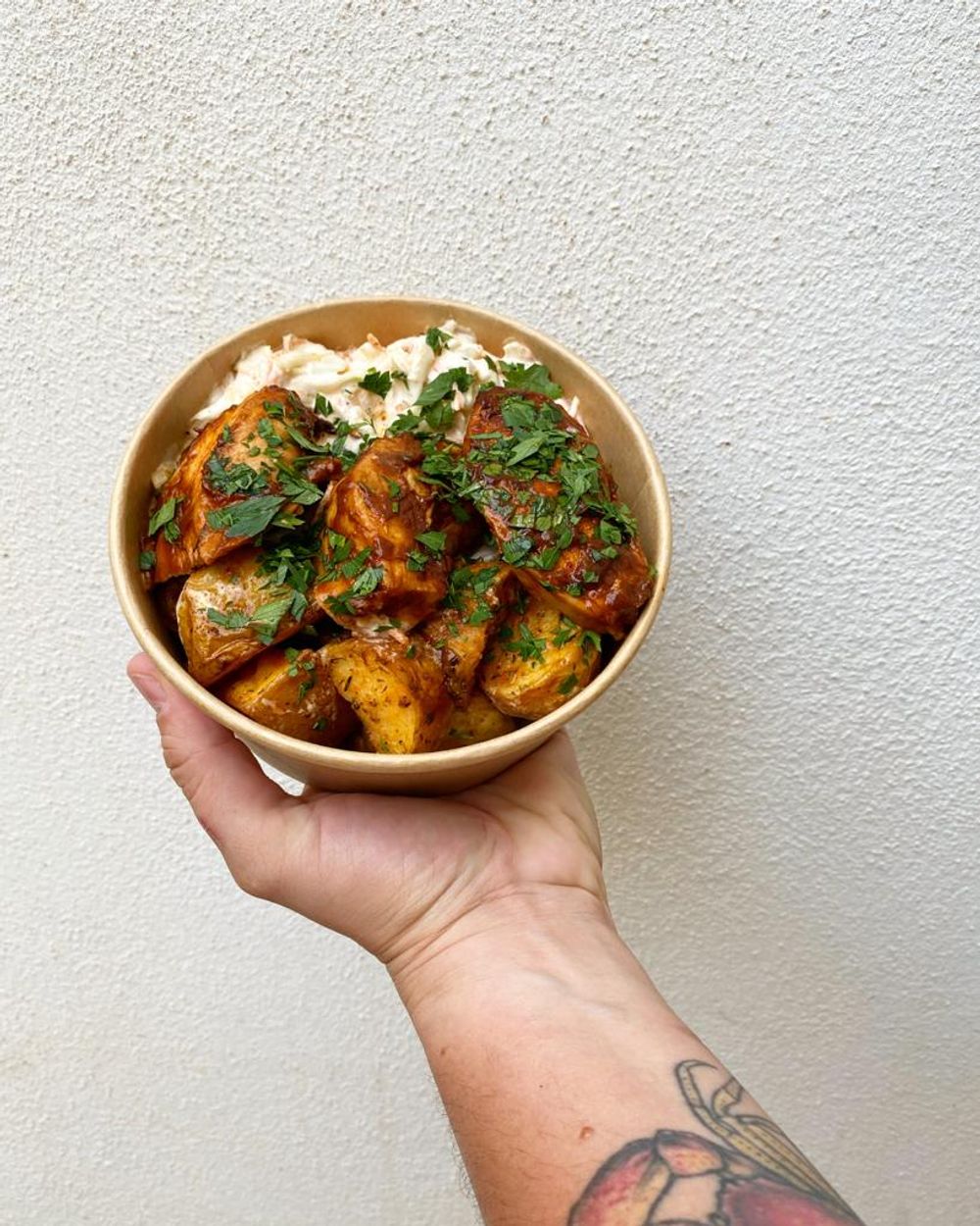 BBQ Chicken dish with potato and coleslaw