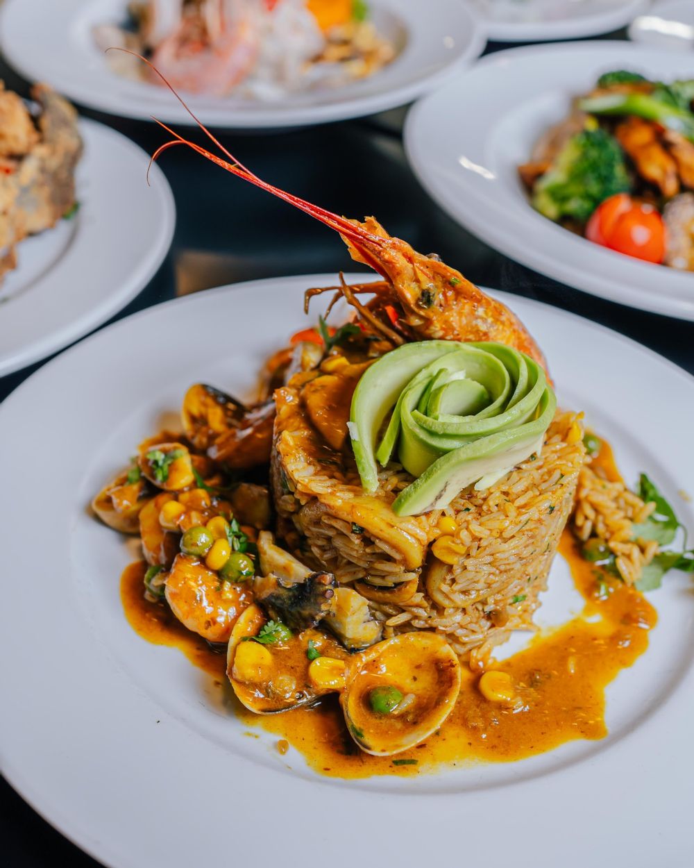 Arroz con Mariscos; a rice and flambéed seafood dish with prawns