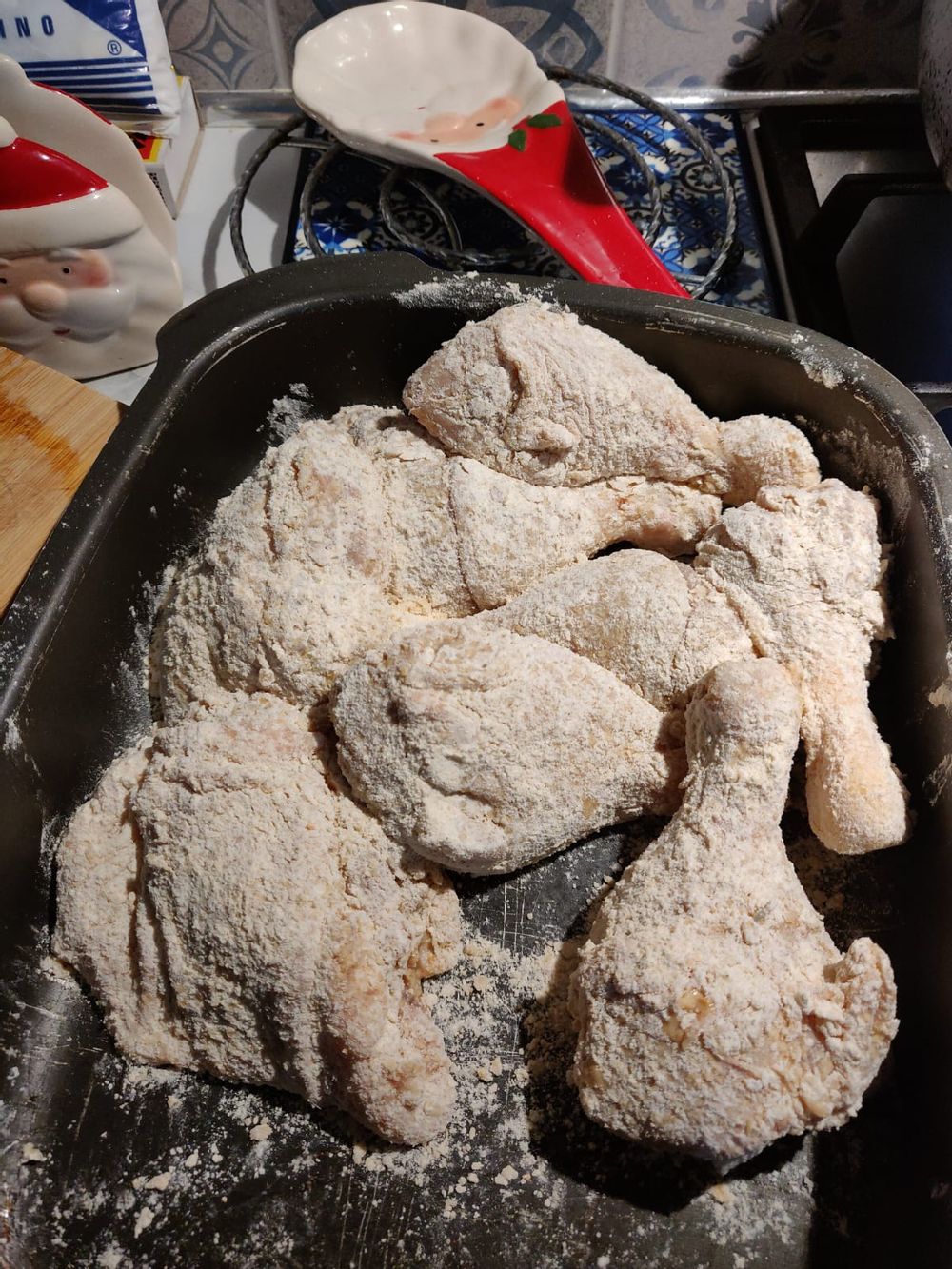 Coated chicken ready to be fried.