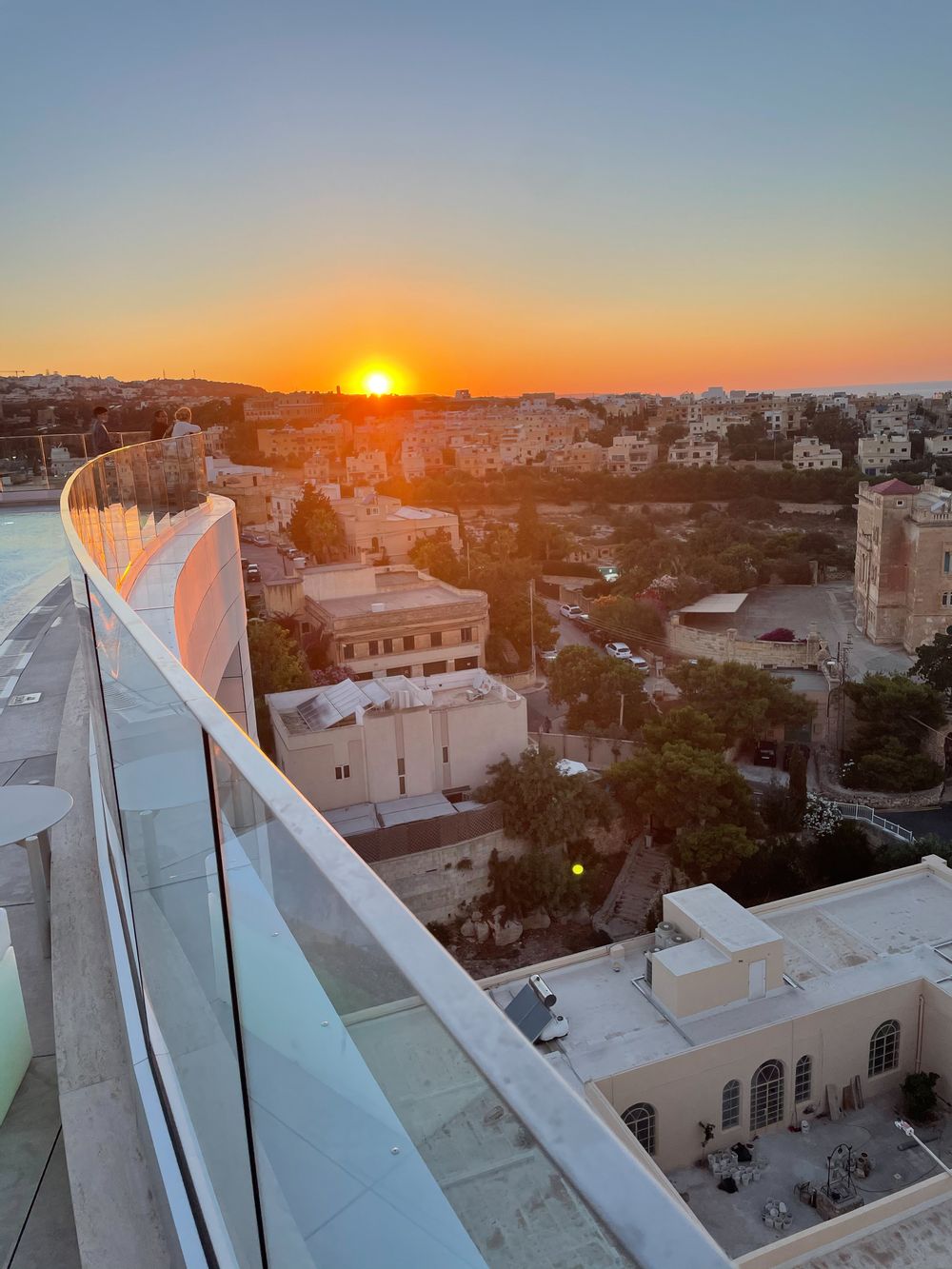Table setting and view at Gin-ger Hyatt Regency St Julian's