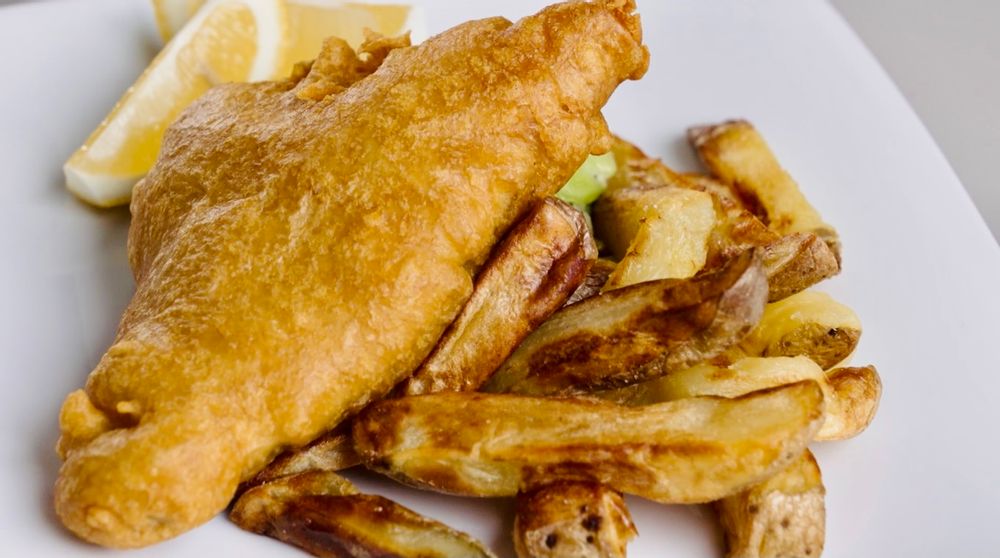 The final dish of Cisk Battered Fish, Twice Cooked Chips and Fancy Peas, prepared by Chef Stephen La Rosa.