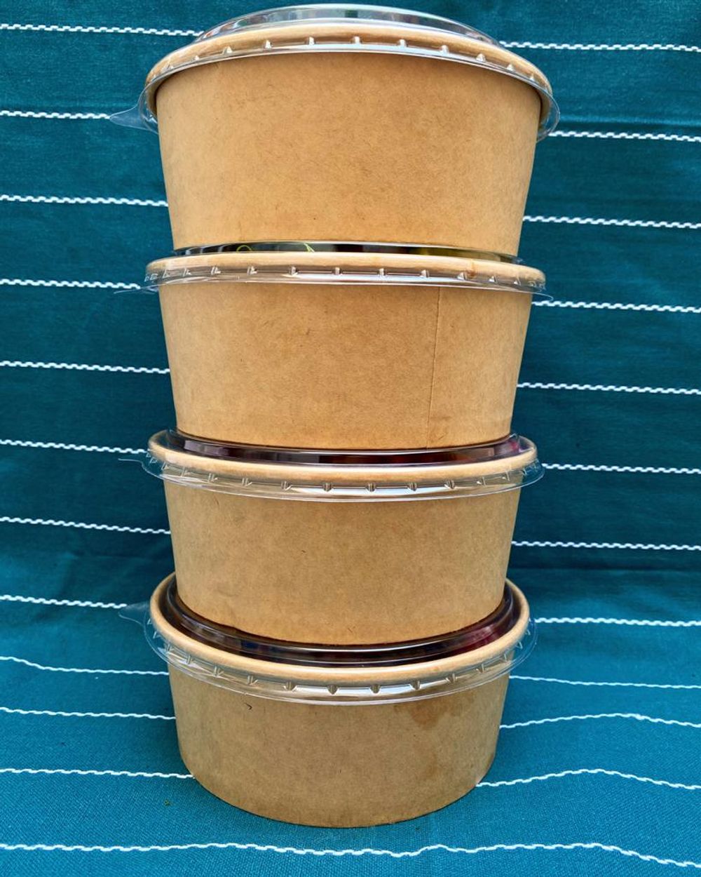 a stack of Inserv take away containers