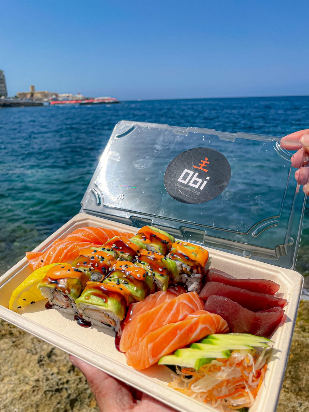 SASHIMI AND SUSHI PLUS OBI SUSHI LOGO IN INSERV PACKAGING