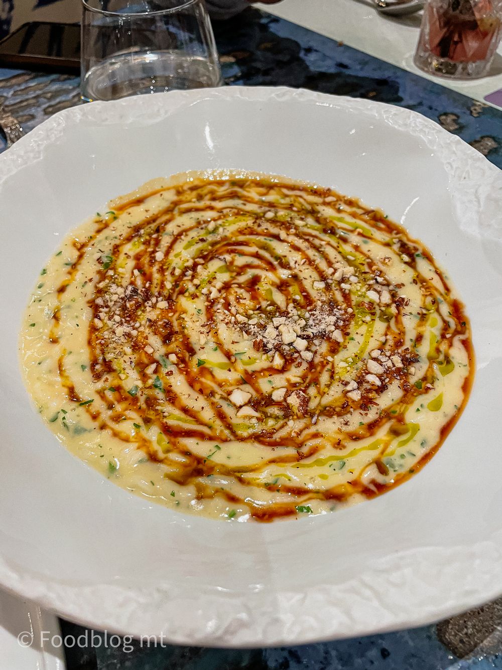 Caramelized celeriac āAcquerelloā risotto, roasted almonds and coffee syrup at Seed