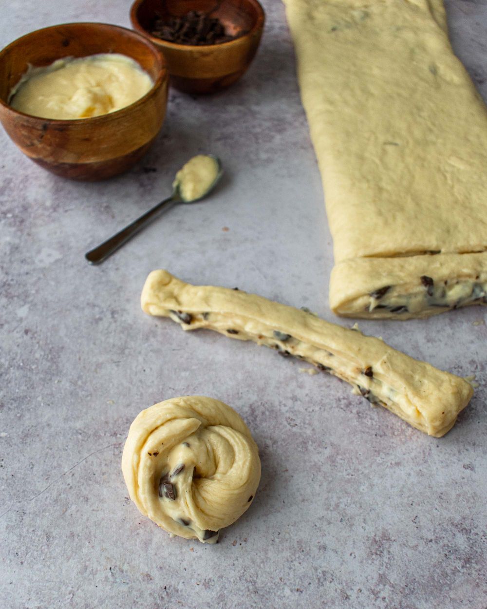 roll strips of pastry into mini buns