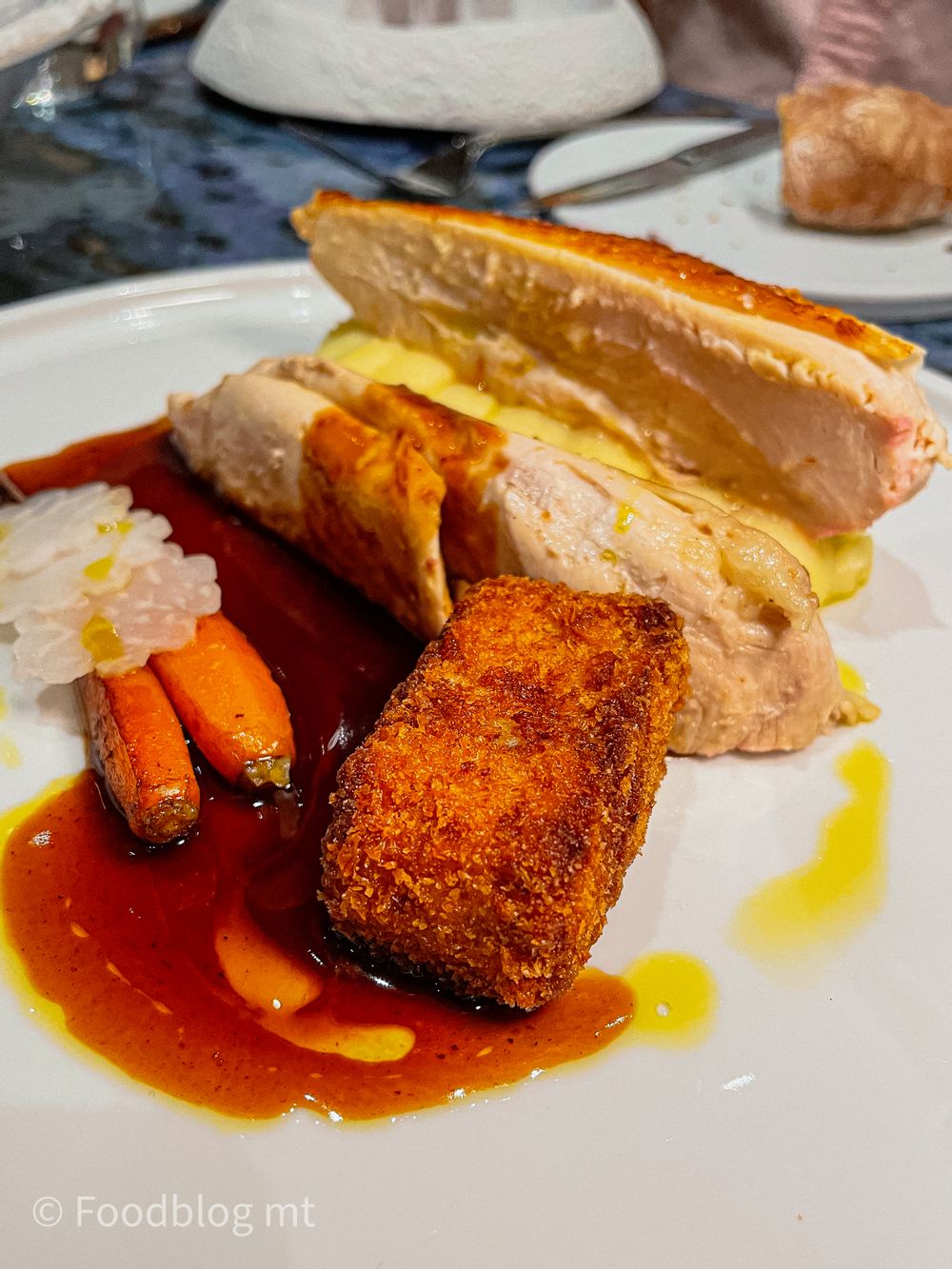 Pan seared chicken breast, confit leg and Pecorino croquette, baby carrots and jus at Seed